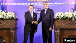 IAEA Director-General Rafael Grossi (left) holds a news conference in Tehran with Iran's nuclear energy chief, Mohammad Eslami, on May 7.