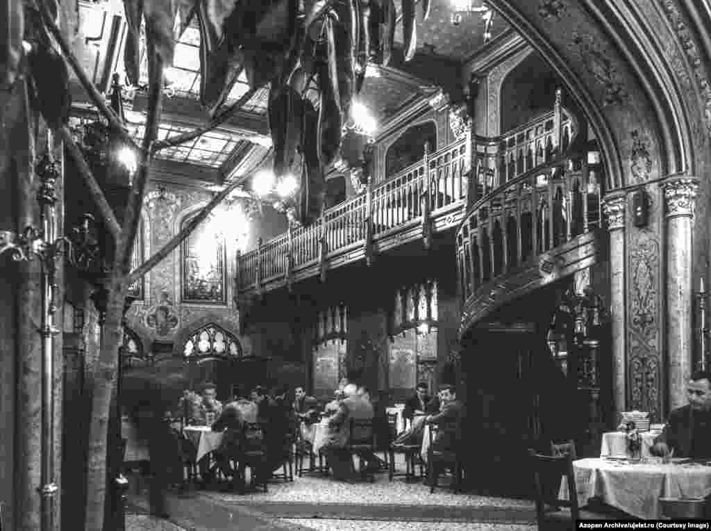 The interior of Bucharest&rsquo;s Caru cu bere (The Beer Wagon) photographed in 1965 Uj Elet, meaning &quot;New Life,&quot; was a Hungarian-language publication targeted at the approximately 1 million Hungarian speakers in Romania. The magazine began publication in 1959.