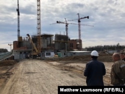 Workers at the construction site of the Armed Forces Cathedral at Patriot Park, outside Moscow