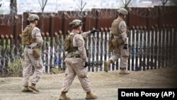 U.S. forces deploy along the U.S.-Mexico border near San Diego with Tijuana.