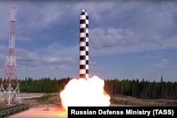 Russia's Sarmat intercontinental ballistic missile blasts off during a test launch from an undisclosed location in Russia on July 19, 2018.