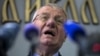 Vojislav Seselj speaks during a news conference inside his Serbian Radical Party headquarters in Belgrade on April 2.