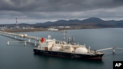 The tanker Sun Arrows loads its cargo of liquefied natural gas from the Sakhalin-2 project in the port of Prigorodnoye, Russia, in October 2021. 