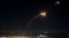 Rockets fired from southern Lebanon are intercepted by Israel's Iron Dome air-defense system over northern Israel on August 4