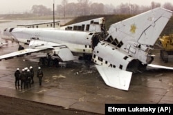 A Tu-22 strategic bomber being destroyed as part of the denuclearization of Ukraine in November 2002.