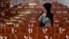 Afghanistan -- A 19-year old Hazara Afghan girl sits and cries on the bench she was sitting on, during Friday's suicide bomber attack on a Hazara education center, in Kabul, Afghanistan, Saturday, Oct. 1, 2022