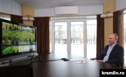 Russian President Vladimir Putin in a virtual meeting with students at his residence outside Moscow on January 25