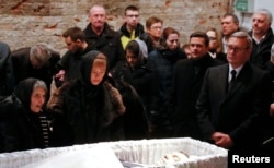 Family and friends pay their last respects during a memorial service for Nemtsov's funeral in Moscow on March 3.