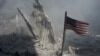 An American flag flies near the base of the destroyed World Trade
Center in New York, one of the targets of the September 11, 2001 terrorist attacks. 