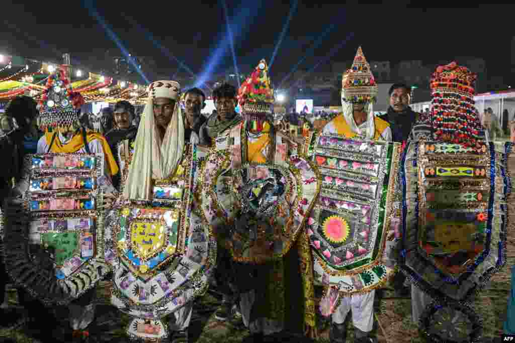 Pakistani Hindu grooms arrive to attend a mass marriage ceremony organized by the Pakistan Hindu Council, a nonprofit organisation, in Karachi.