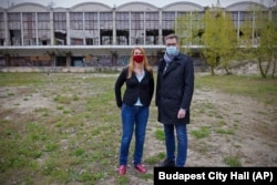 Budapest Mayor Gergely Karacsony (right) and Krisztina Baranyi, the mayor of Budapest's 9th district, pose at the planned site of the Chinese Fudan University campus in Budapest on April 26.