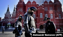 Russian riot police patrol to prevent possible protests in support of Navalny in central Moscow in February.