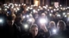 <div>
<div>
<div>
<div>Demonstrators flash mobile phone lights during a protest against government policies, corruption, and negligence, which they blame for the deaths of the victims in the November 2024 Novi Sad railway station disaster, in Belgrade on January 24.</div>
</div>
</div>
</div>
<div>&nbsp;</div>
