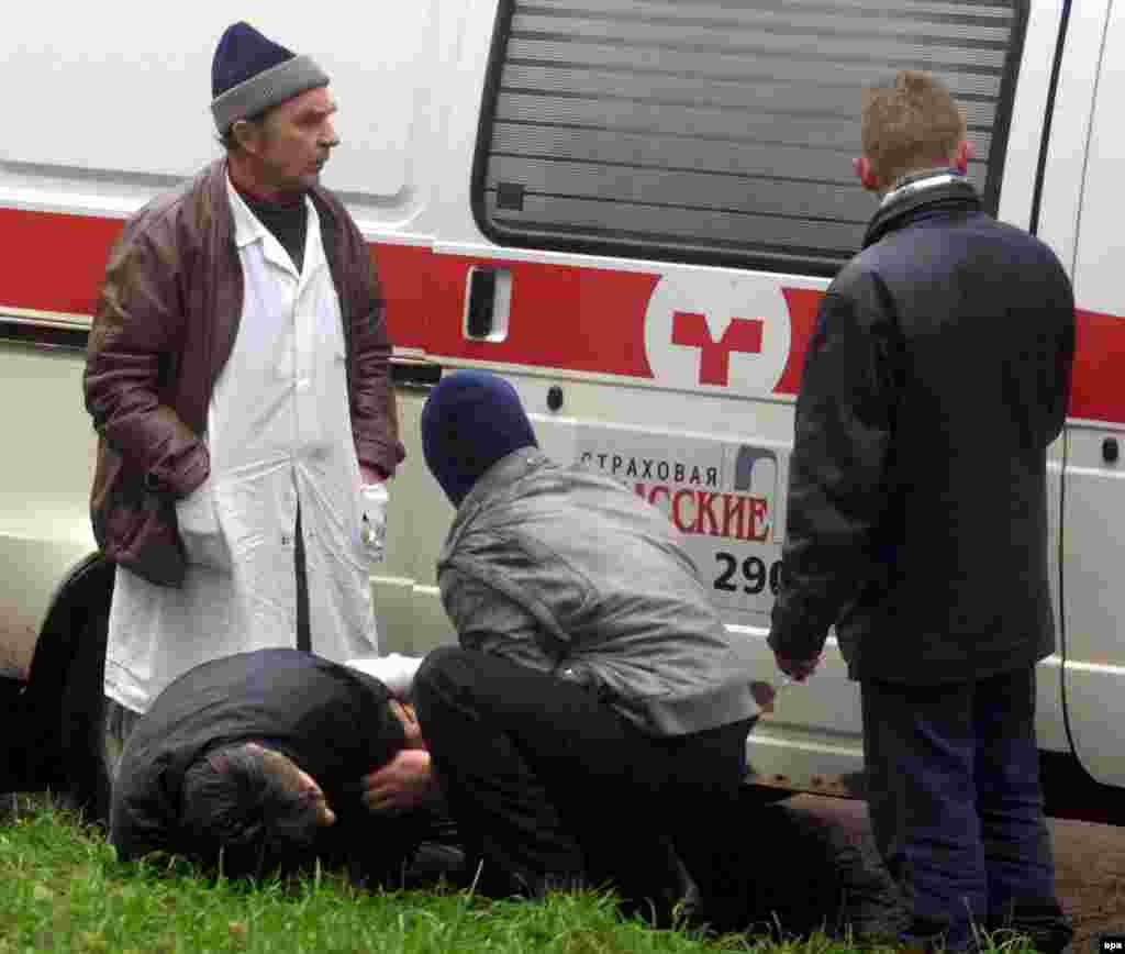 On October 26, the fourth day of the hostage crisis, special forces stormed the theater. Here, doctors help a hostage wounded in the raid.