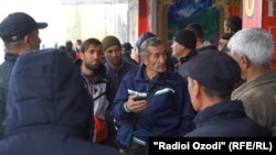 With many unable to leave for Russia to work, groups of men are gathering in the so-called labor market in Dushanbe, waiting for customers to hire them for temporary jobs. 