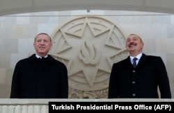 Erdogan (left) joined his Azerbaijani counterpart, Ilham Aliyev, to review the parade.