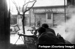 Red Army soldiers fighting in the suburbs of Budapest in early 1945.