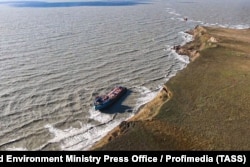 An oil tanker washed ashore on the coast of Russia's Krasnodar region photographed on December 16.