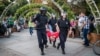 Mikhail Bykanov is carried away by riot police amid protests in Moscow on July 27.