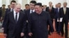 Vladimir Putin (left) and North Korean leader Kim Jong Un attend a gala concert during the Russian president's visit to Pyongyang on June 19. 