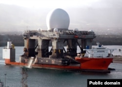 America’s Sea-Based X-Band Radar, designed to track incoming ICBMs, is transported by ship into Pearl Harbor, Hawaii, in 2006