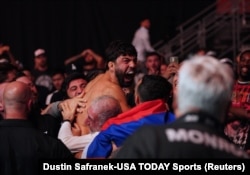 Arman Tsarukyan celebrates with supporters after victory in a UFC event in Texas in December 2023.