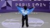 Afghan refugee breaker Manizha Talash wore a cape that said "Free Afghan Women" during her pre-qualifier battle in Paris on August 9.