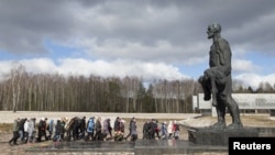 People visit a World War II memorial in the former village of Khatyn, Belarus. (file photo)