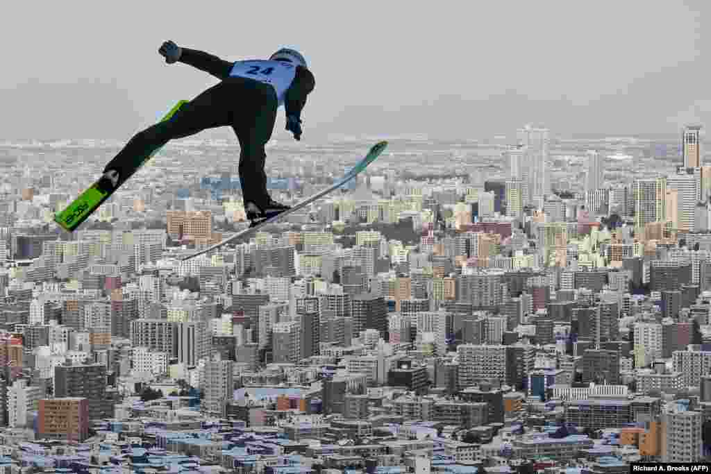 Danil Vassilyev of Kazakhstan takes part in a training run before the start of the qualifying round for the men's FIS Ski Jumping World Cup competition in Sapporo, Japan.