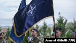 Members of the NATO-led KFOR peacekeeping mission attend a ceremony in Pristina. (file photo)