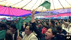 People shout anti Osama Bin Laden slogans during an opposition rally in Kabul on May 5