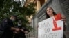 A journalist holds a placard which reads "Foreign agents yourself" near the headquarters of Russia's Federal Security Service (FSB) in Moscow (file photo)