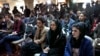 Afghan journalists attend a press conference of former President Hamid Karzai in Kabul in 2022.