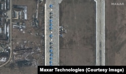 Russian Sukhoi Su-34 military aircraft are lined up at Russia's Morozovsk Air Base.