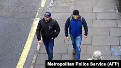 A handout picture released by British police showing what are believed to be two Russian security agents involved in the attempted poisoning in Salisbury of former spy Sergei Skripal and his daughter in 2018. 