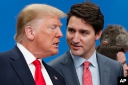 Canadian Prime Minister Justin Trudeau (right) with Donald Trump in 2019.