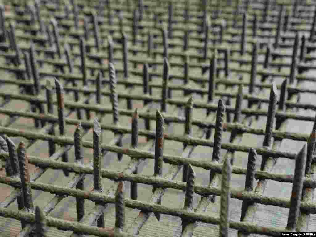 This grid of sharpened rebar was one of countless such grates placed alongside the Berlin Wall from the mid-1960s, designed to pierce the shoes of fleeing East Germans. This section of &quot;Stalin&#39;s Lawn&quot; has been preserved in a museum of the The Berlin Wall Foundation.&nbsp;