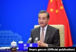 Wang Yi speaks at the G20 foreign ministers' meeting via video link in Beijing on June 29.