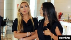 Ilham Aliyev's daughters, Arzu (left) and Leyla, are listed as senior managers at the Panamanian-registered companies.