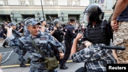 Beatings, Arrests As Russians Protest Pension Reforms