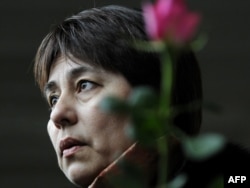 Nadezhda Ataeva attends a rally in 2011 in favor of detained Uzbek human rights defenders in front of the European Commission building in Brussels.