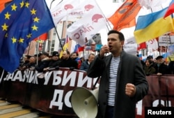 Ilya Yashin addresses supporters during a rally to mark the fifth anniversary of opposition politician Boris Nemtsov's assassination in Moscow in February 2020.