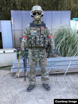 A Japanese cosplayer dressed in the battle equipment of Ukraine’s Azov Battalion.