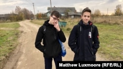 Fifteen-year-old Danil Smirnov (right) says there are only six teenagers left in the village.