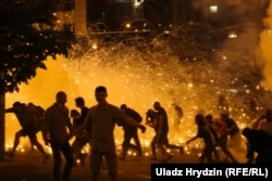 Police clash with protesters on election night in Minsk on August 9-10.