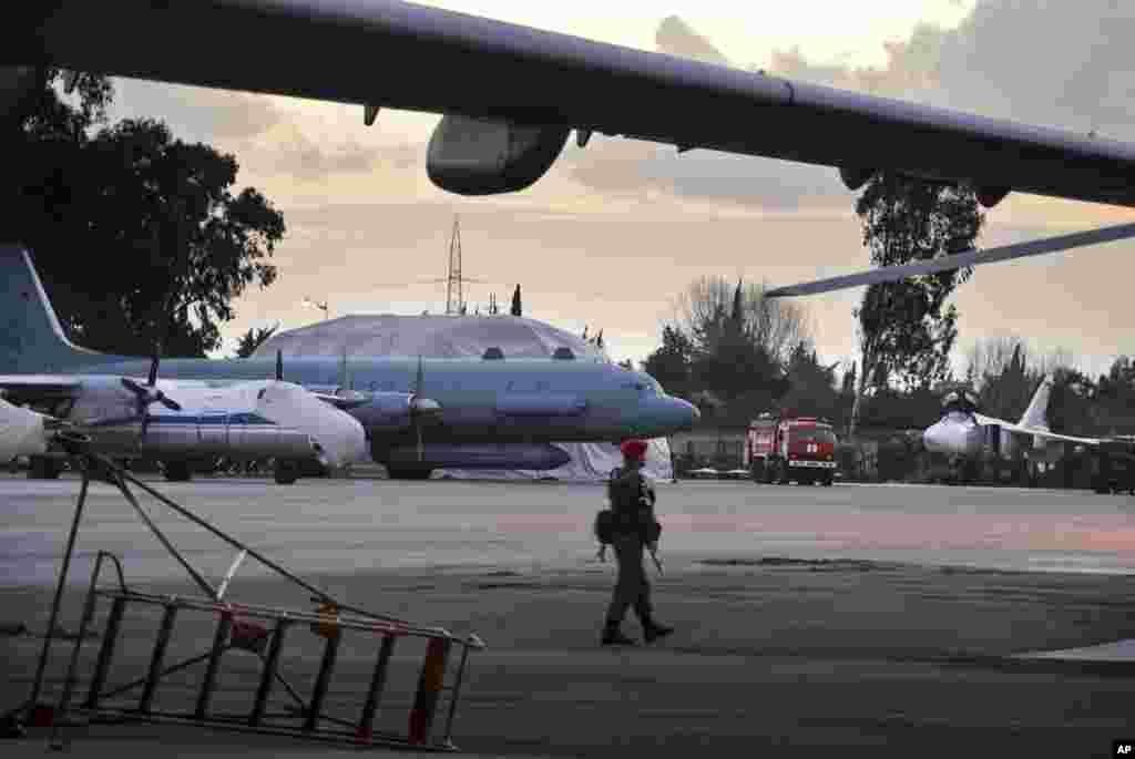 A Russian military policeman patrols the Hmeimim air base in March 2016. Hamilton says it remains to be seen whether talks between Russia and HTS, &quot;are about ensuring an orderly withdrawal of Russian forces from Syria, or about ensuring Russia can maintain its bases there.&quot;