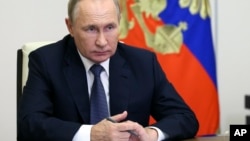 Russian President Vladimir Putin becomes the third serving head of state to be targeted in an arrest warrant from the ICC, along with Sudan's Omar al-Bashir and Libya's Muammar Qaddafi.