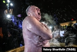 Zhirinovsky bathes in freezing water during celebrations of Orthodox Epiphany in Moscow in 2016.