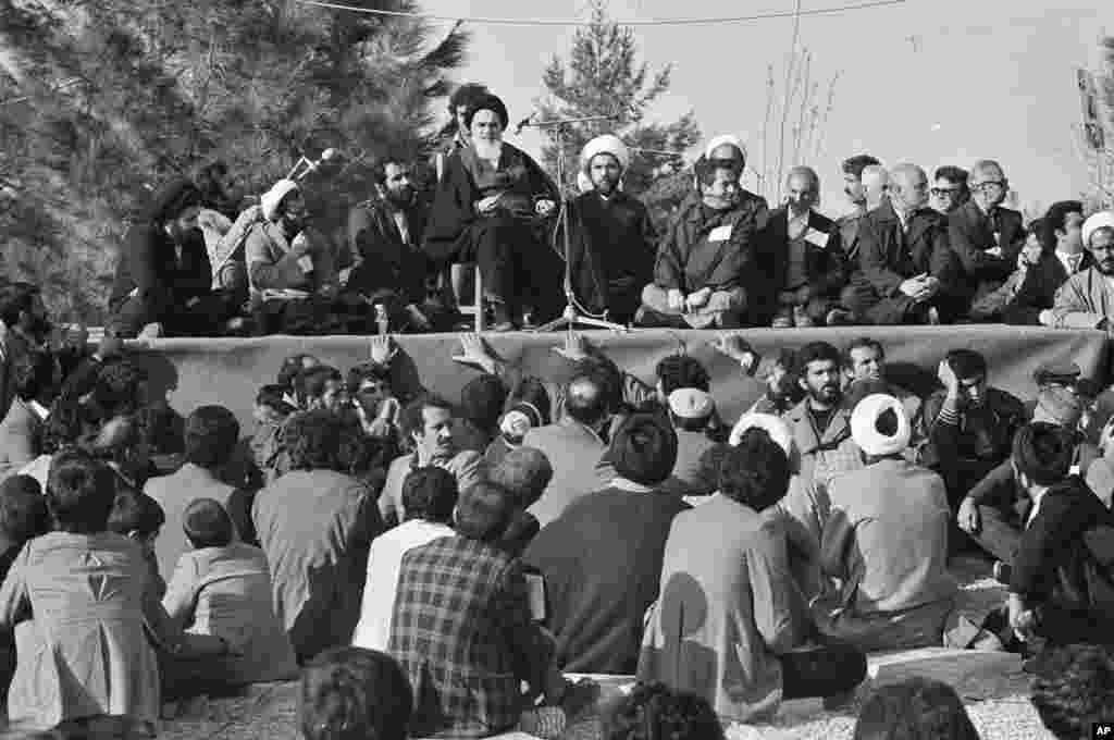 Khomeini delivers a speech at the Behesht-e Zahra cemetery after his return from exile.