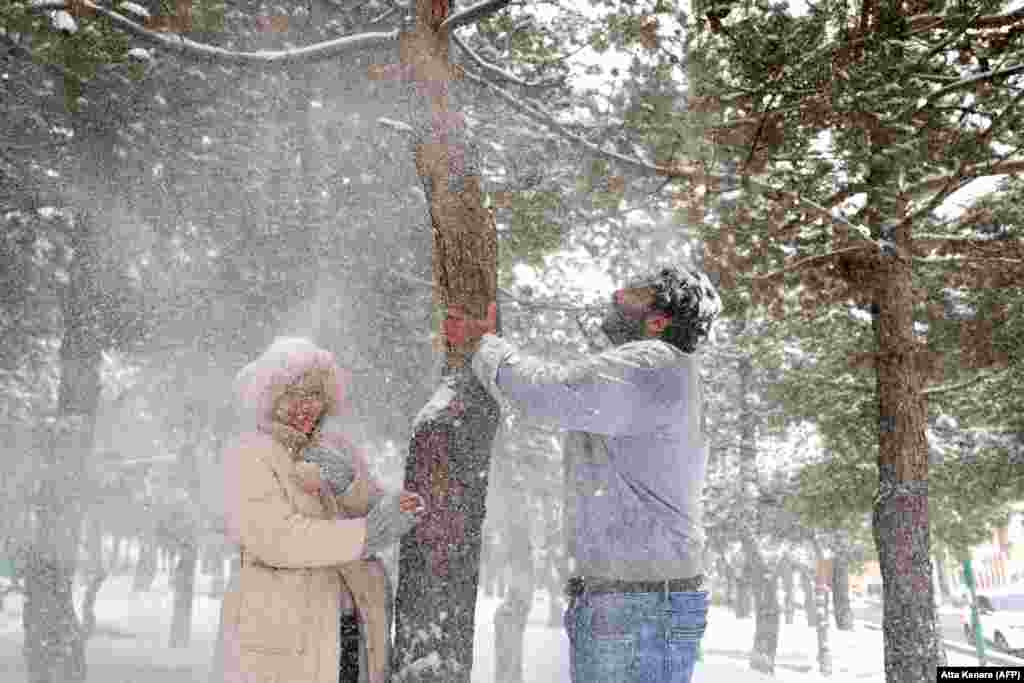 Iranians play in the snow at the Tochal Mountain Resort.